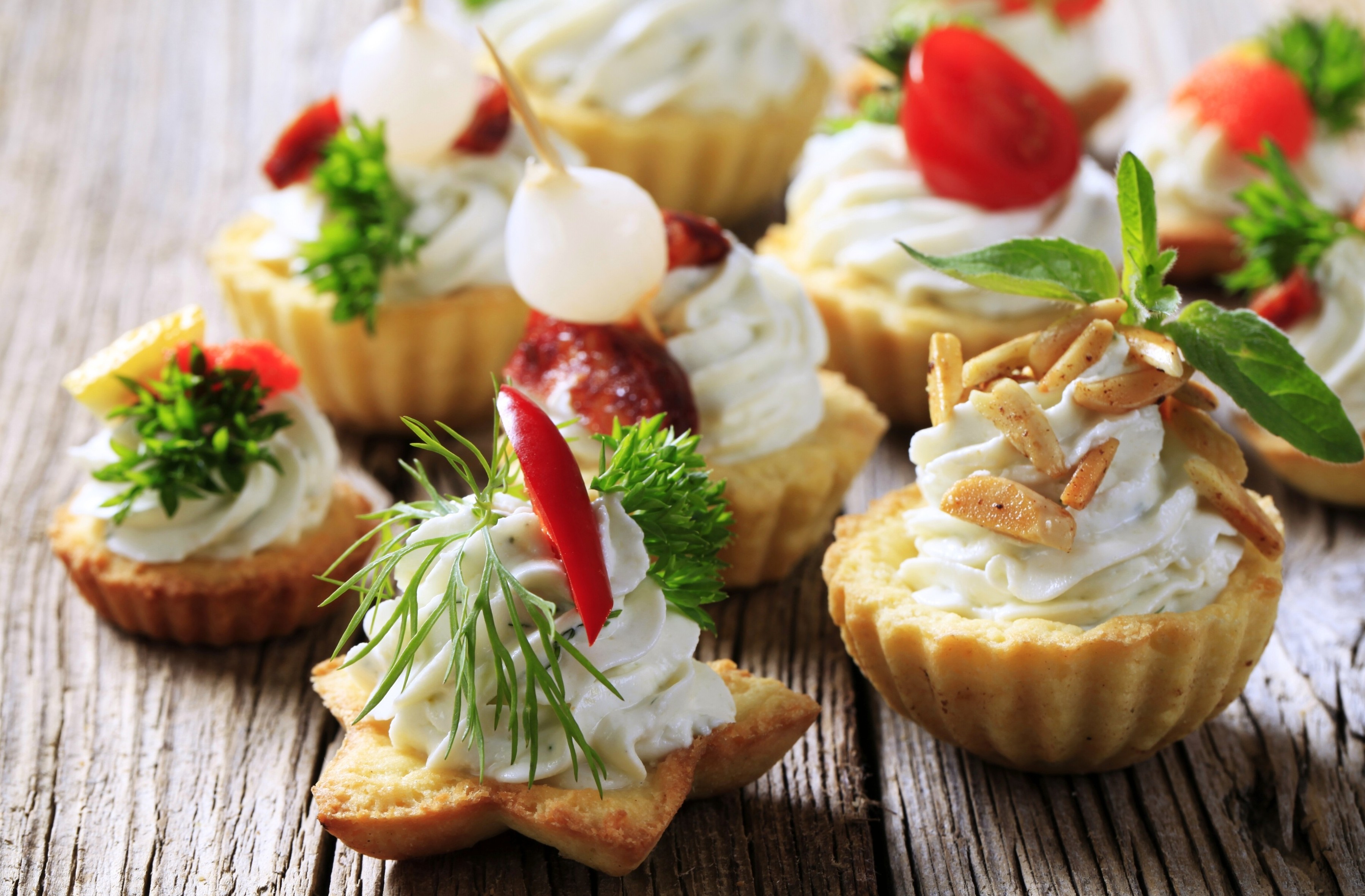 Ideas of small tartlets, mini canap on skewers with cheese