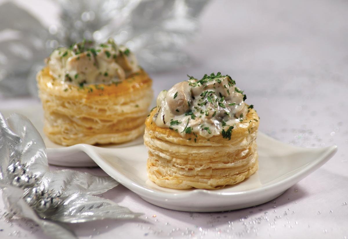 Tartlets with mushrooms and cheese baked in the oven