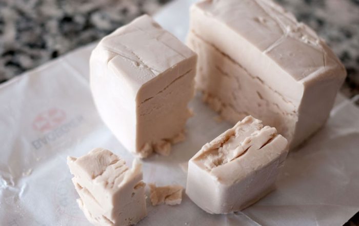 cutted living yeast in front of the starter to feed cabbage
