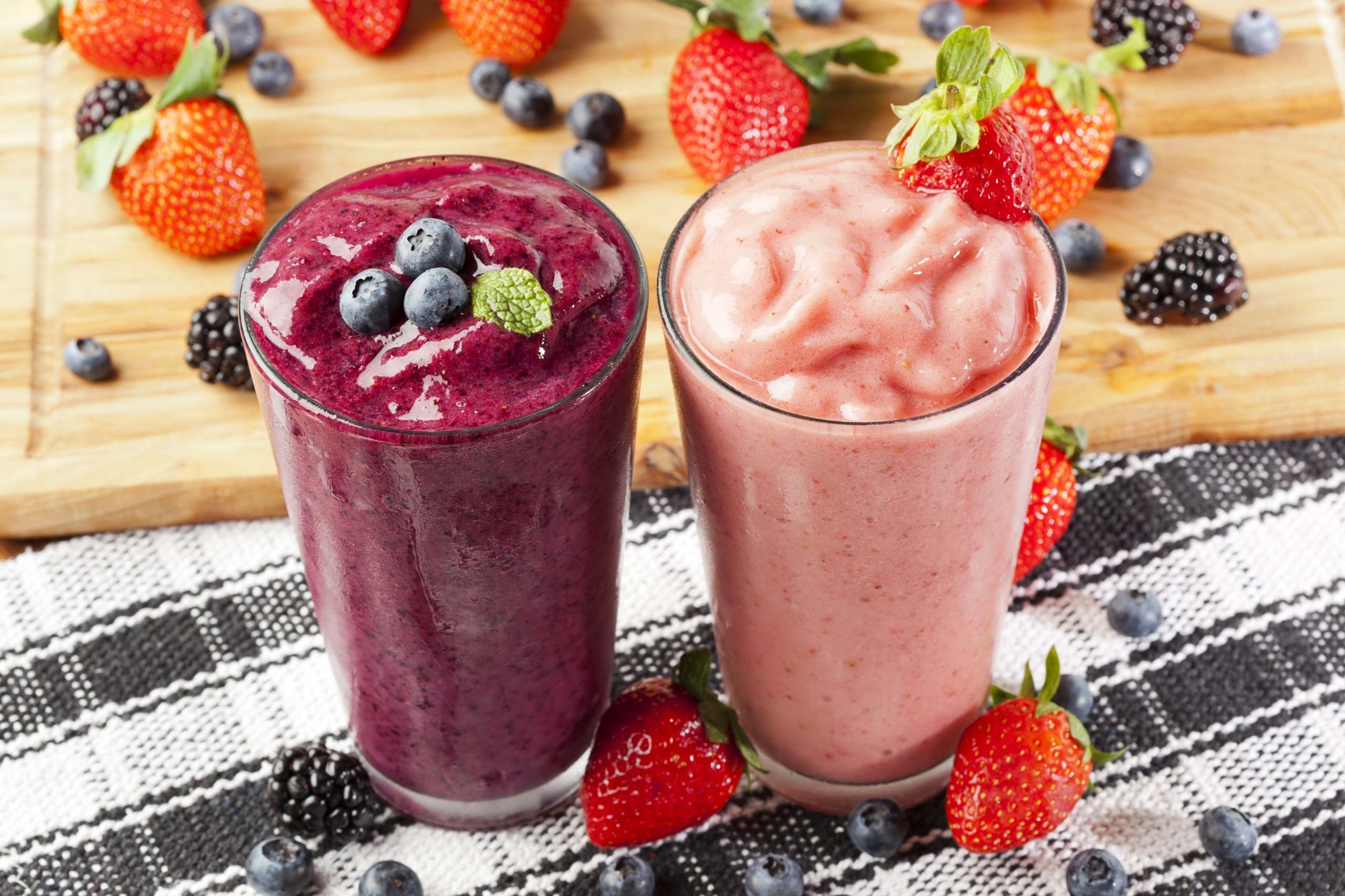 Children smoothies from fruit with cranberries and cocoa