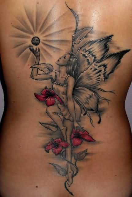 Amazing-Extreme-Crazy-Angel-With-Lovely-Flowers-Tattoo-Design-Make-On-Lower-Back